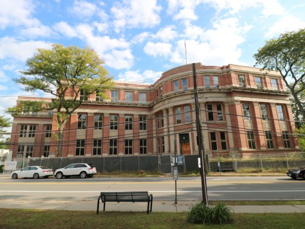 outside of 144,000 square foot building for sale at maltz auctions in new york