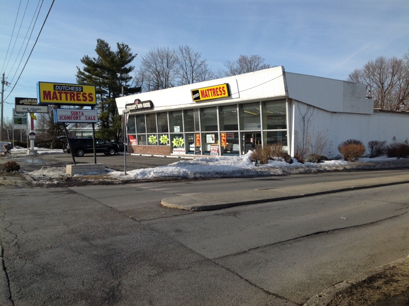exterior of retail building for sale at maltz auctions in new york