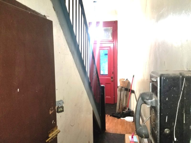 entryway in mixed use building for sale at maltz auctions