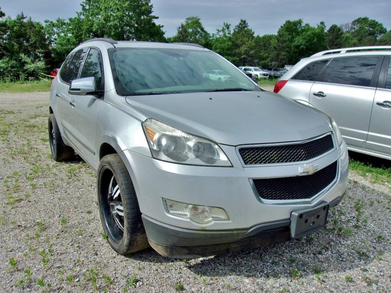 silver ford suv vehicle for sale at automobile auction