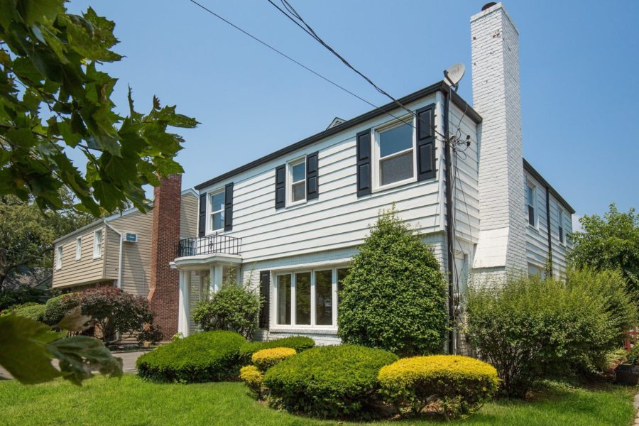 angled front view of 4 bedroom home for sale at maltz auctions