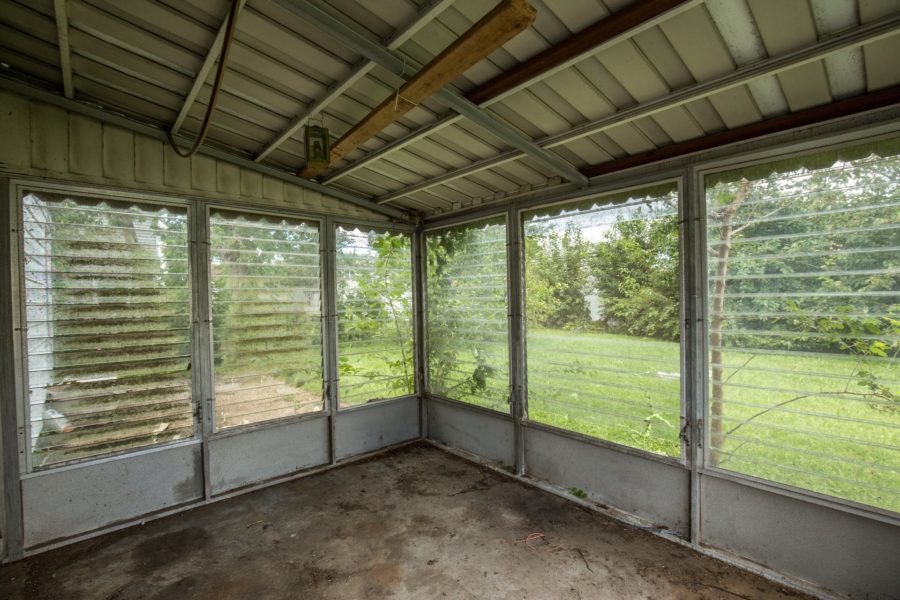indoor porch on property for sale at Maltz Auctions