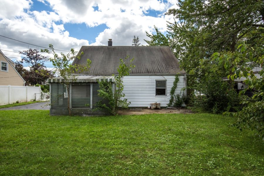 view of back of home for sale at Maltz Auctions